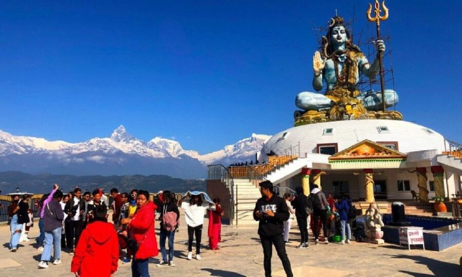 From Pokhara: Guided Day Jungle Hiking Tour with Boat Ride - Davis Falls in Pokhara: water, photos, and the return loop
