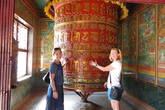 Half Day Tibetan Cultural tour Pokhara - Buddhist symbols at the monastery: what prayer wheels and flags mean