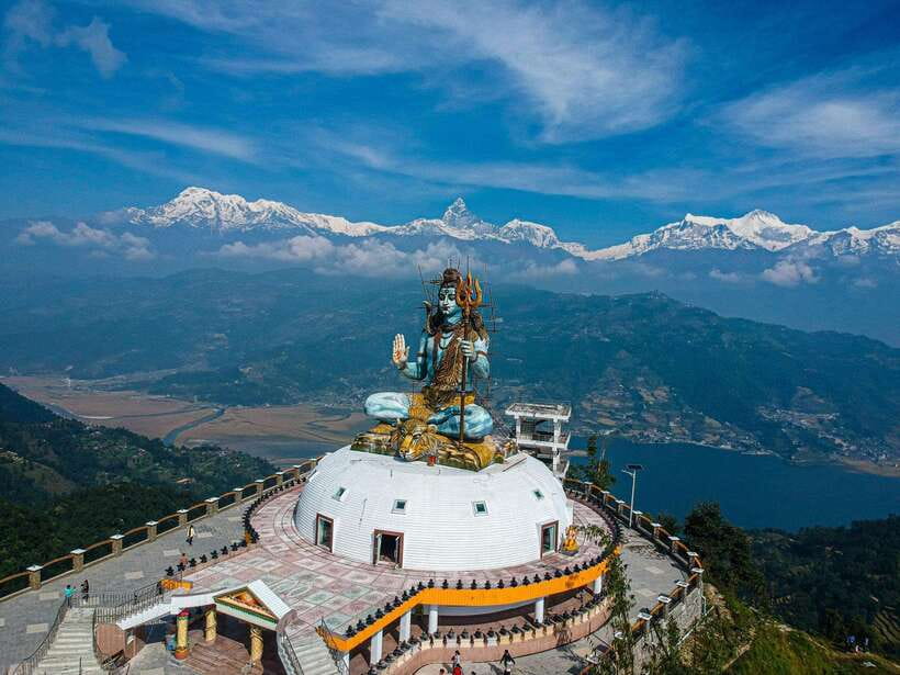 Pokhara: City Sightseeing Group Bus Tour - Stop 1: Pumdikot Mahadev Shiva Idol (Quick, Meaningful, and Local)